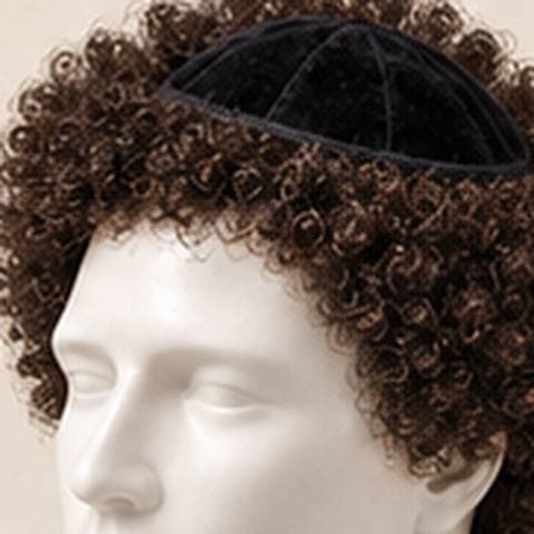 Afro Hairmulka: black velvet kippah surrounded by a full rounded curly hairstyle